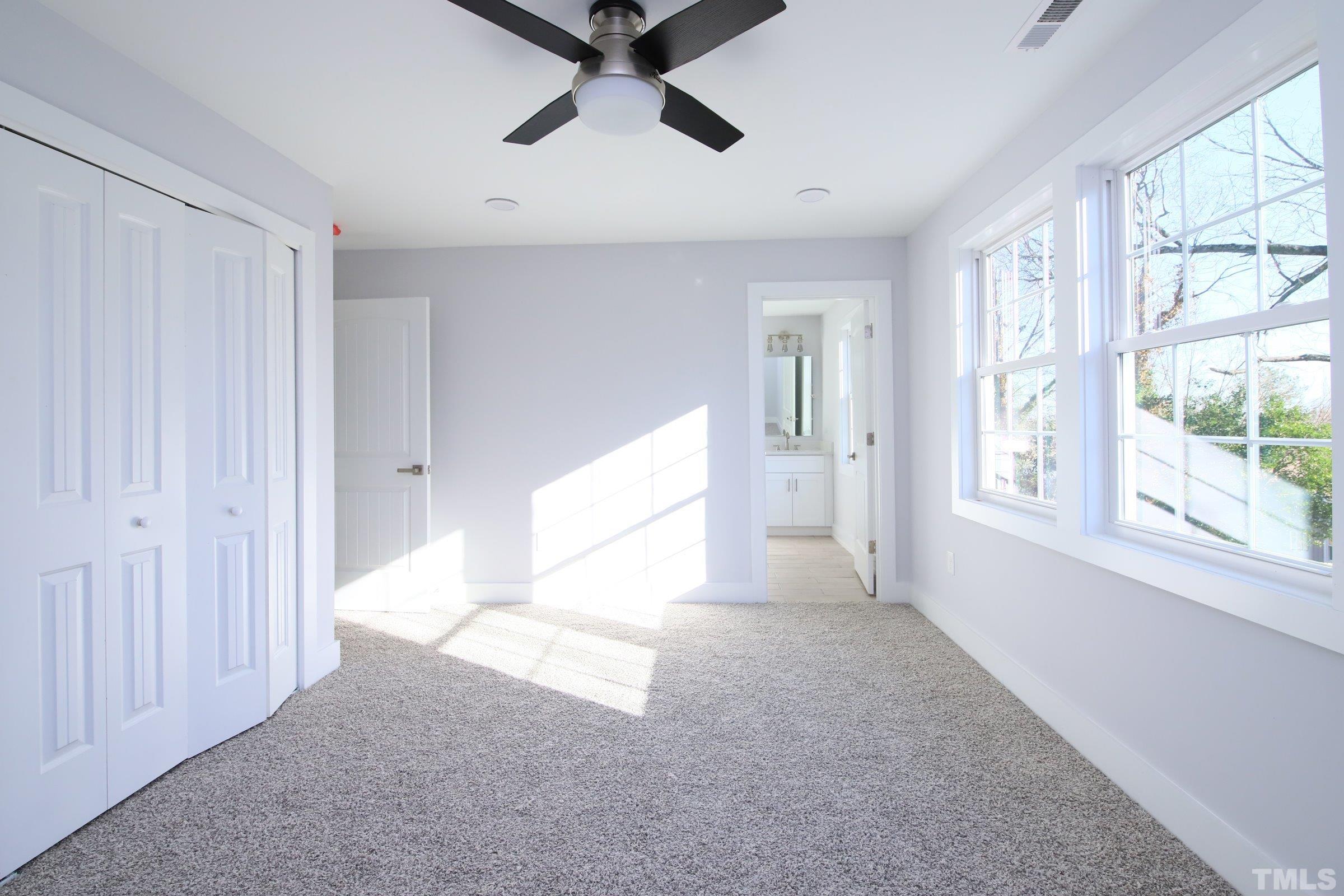 1412 East Jones Street Raleigh, NC 27610 - Photo 21 of 41 a view of an empty room with a window