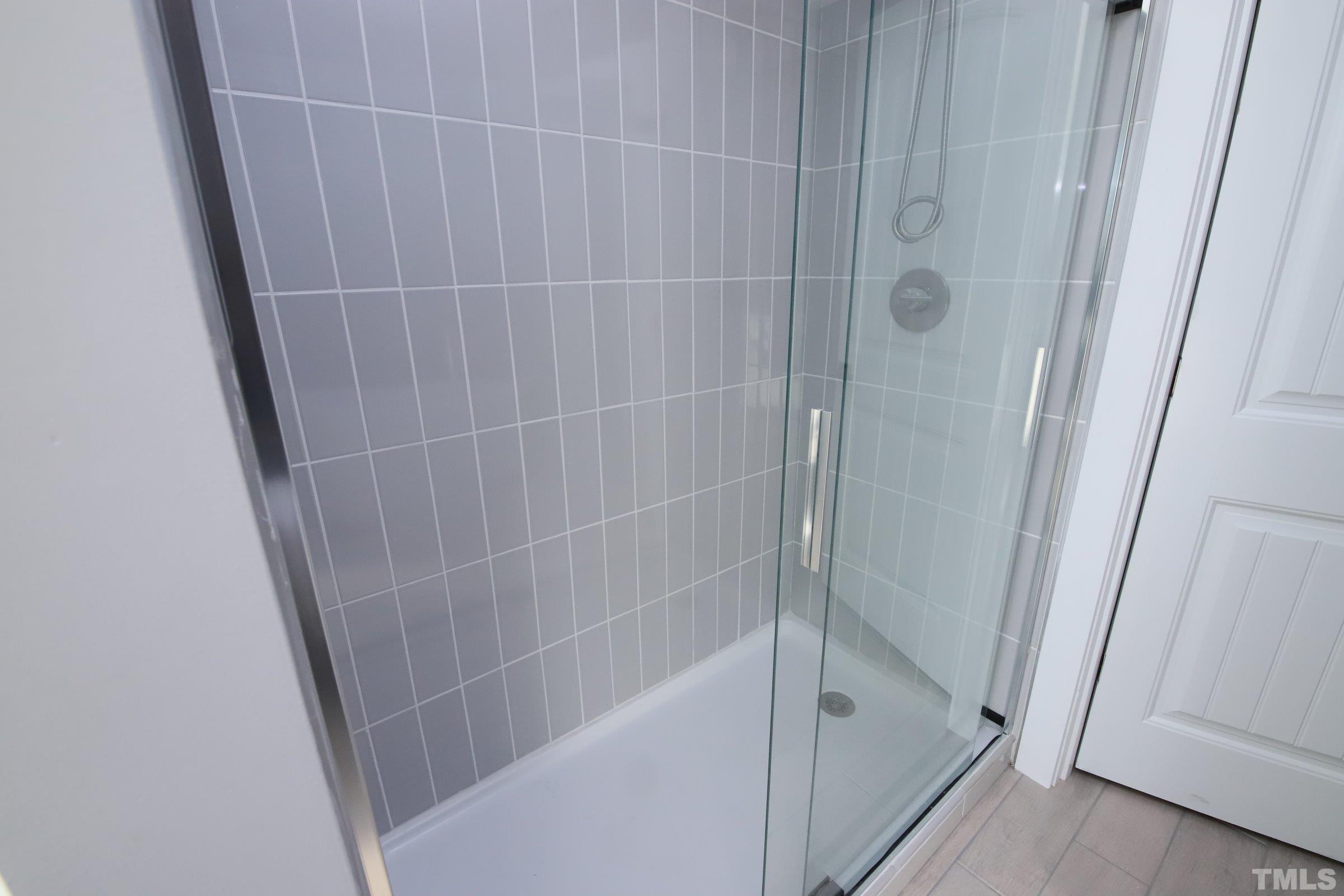 1412 East Jones Street Raleigh, NC 27610 - Photo 25 of 41 a bathroom with a shower