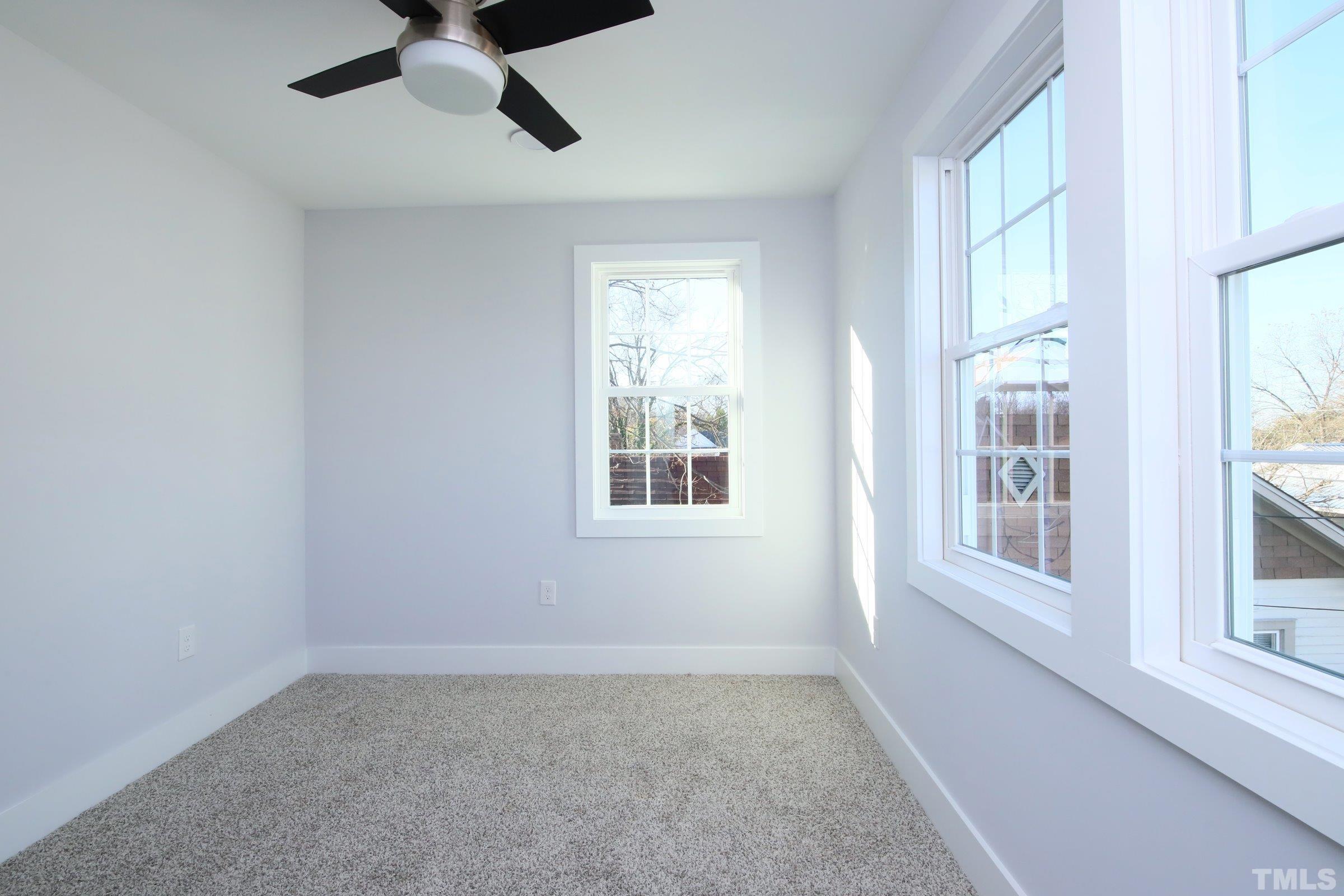 1412 East Jones Street Raleigh, NC 27610 - Photo 26 of 41 an empty room with a window