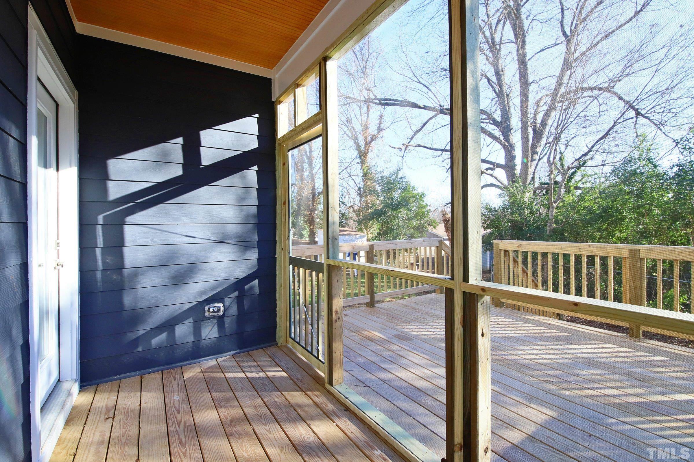1412 East Jones Street Raleigh, NC 27610 - Photo 33 of 41 a view of balcony with wooden floor