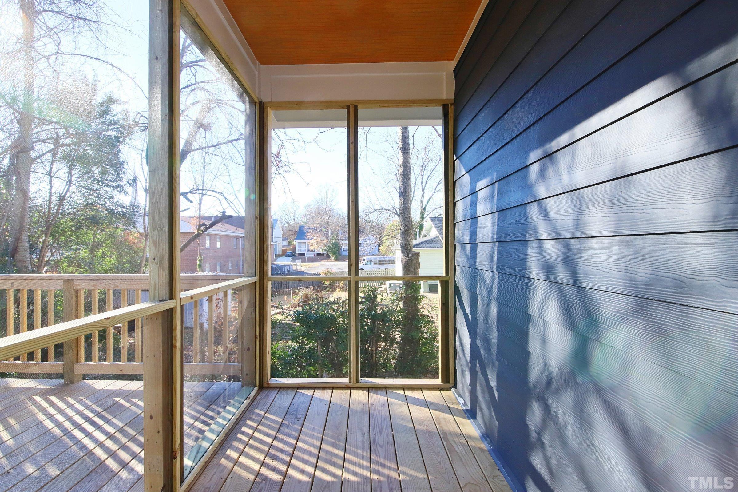1412 East Jones Street Raleigh, NC 27610 - Photo 34 of 41 a view of a balcony with wooden floor