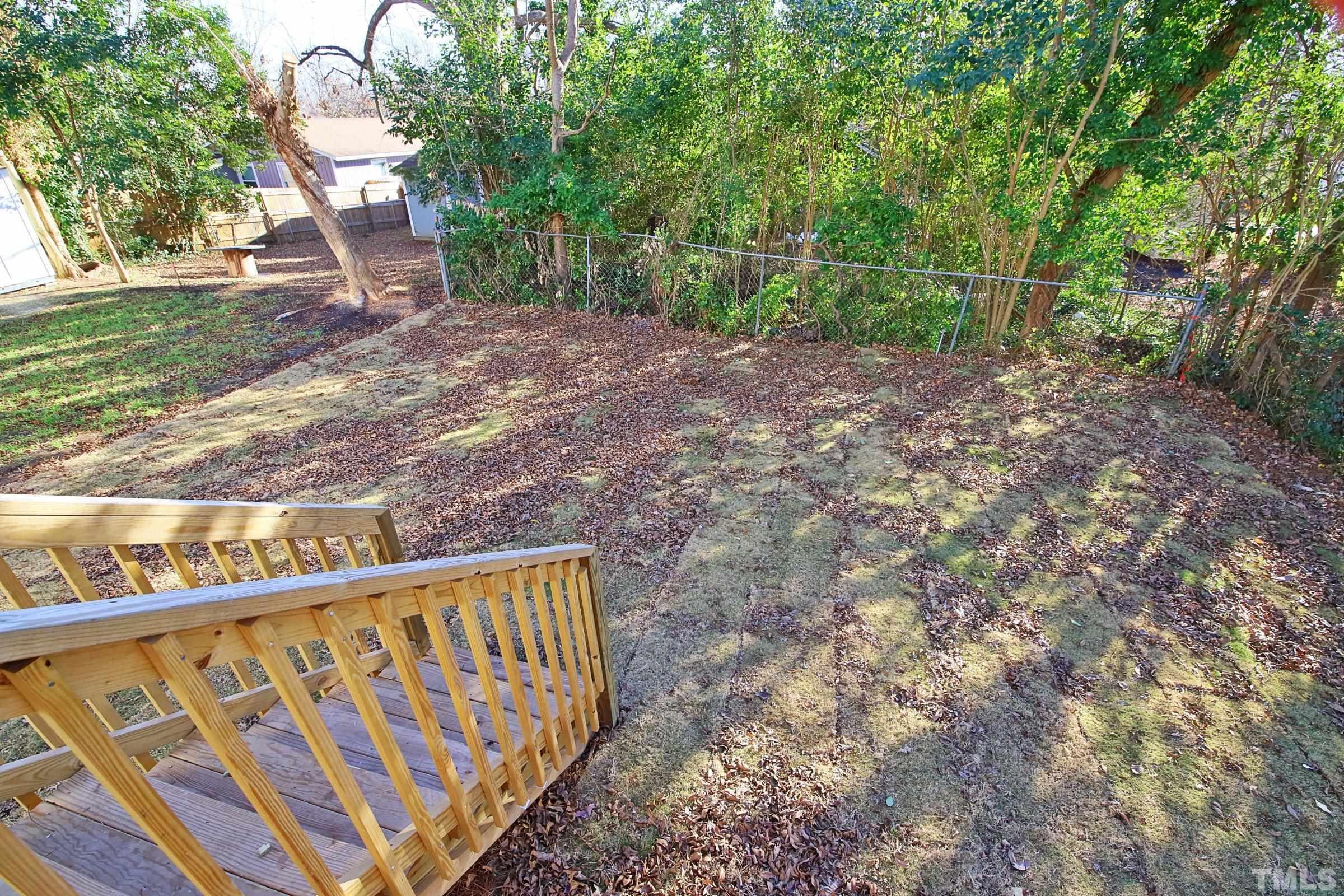 1412 East Jones Street Raleigh, NC 27610 - Photo 36 of 41 a view of a backyard with pathway