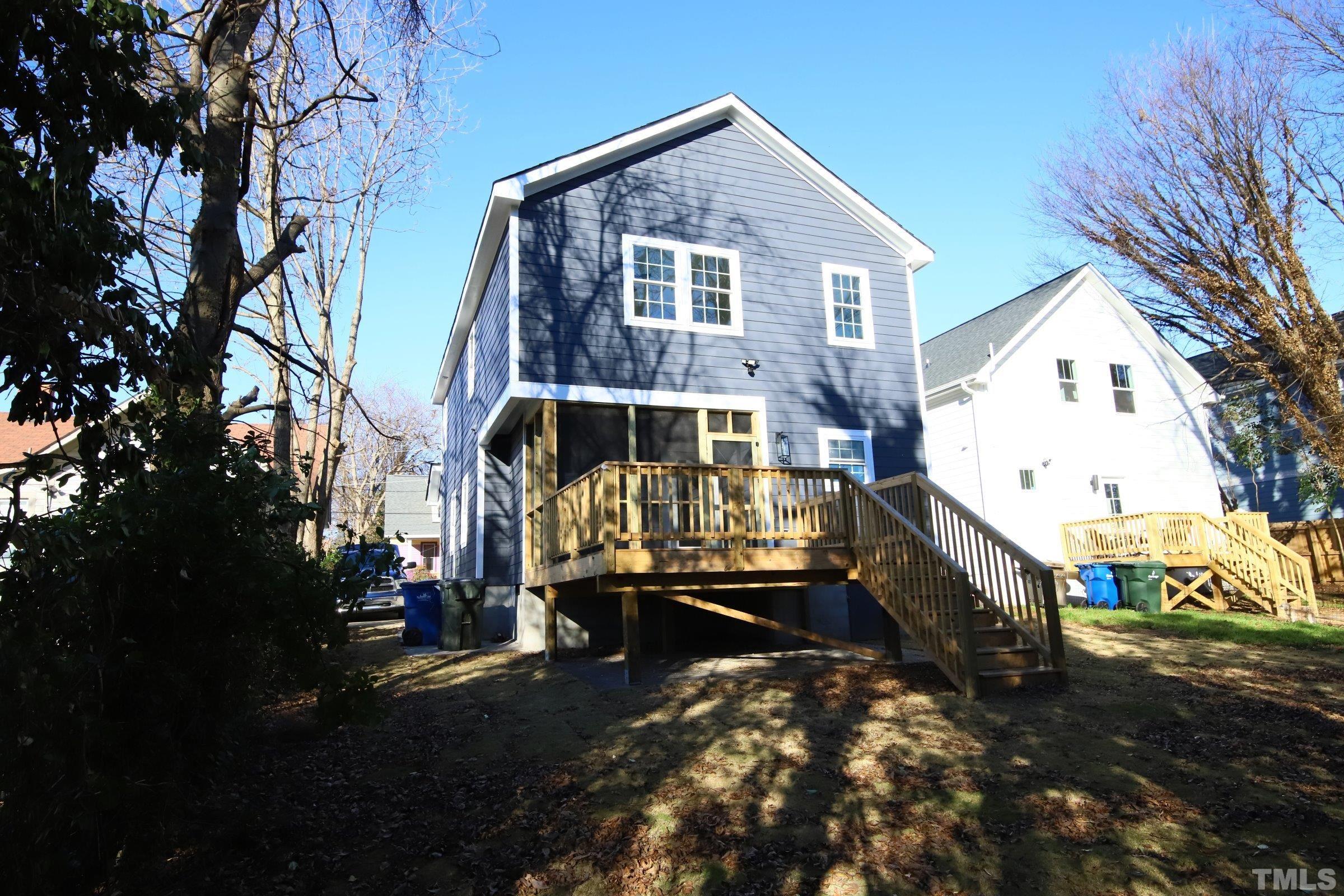 1412 East Jones Street Raleigh, NC 27610 - Photo 40 of 41 a view of a house with a yard