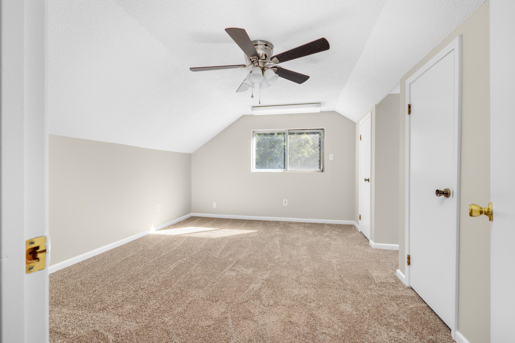 766 Fite Road Memphis, TN 38127 - Photo 18 of 30 an empty room with a ceiling fan and windows