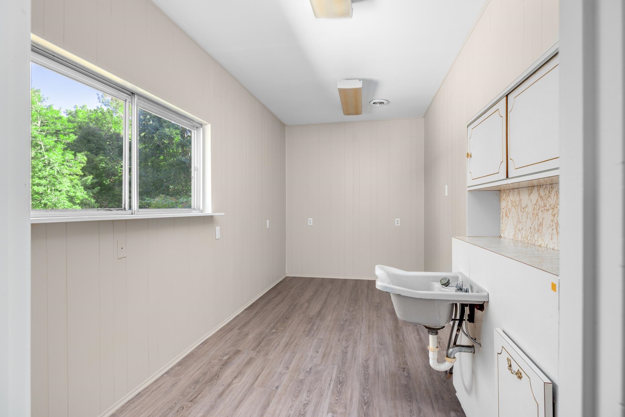 766 Fite Road Memphis, TN 38127 - Photo 22 of 30 a view of a room with a window and wooden floor