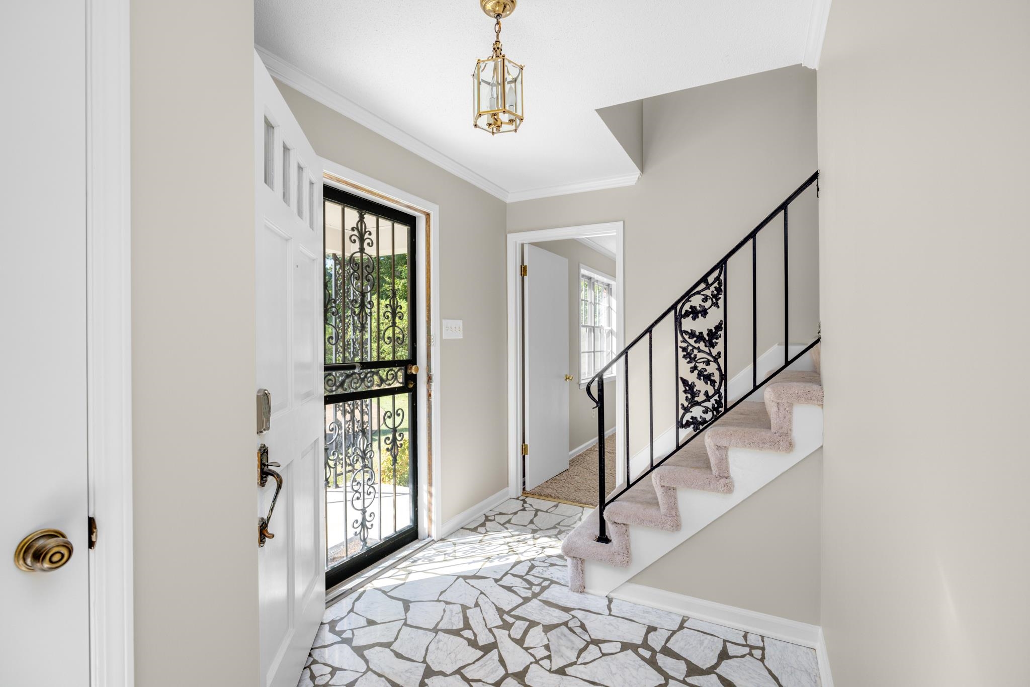 766 Fite Road Memphis, TN 38127 - Photo 4 of 30 a view of entryway with stairs and wooden floor