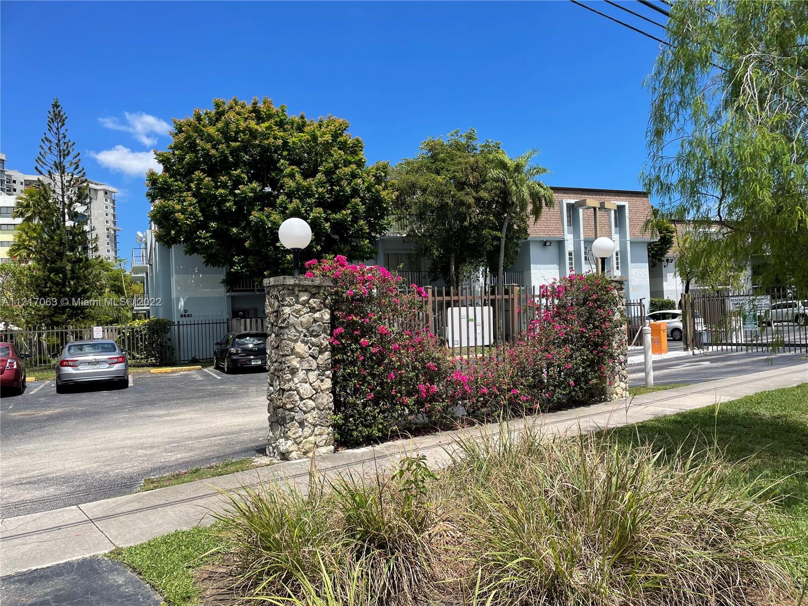 9611 Southwest 77th Avenue, Unit 108A Miami, FL 33156 - Photo 2 of 12 a view of a house with a patio