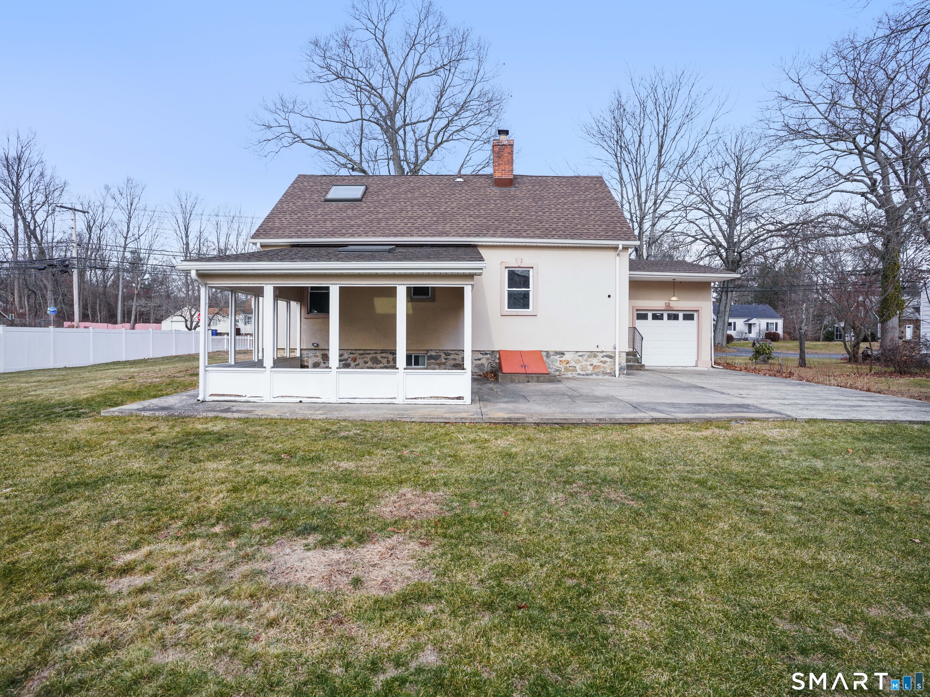 3125 Old Town Road Bridgeport, CT 06606 - Photo 10 of 24 a front view of a house with a yard