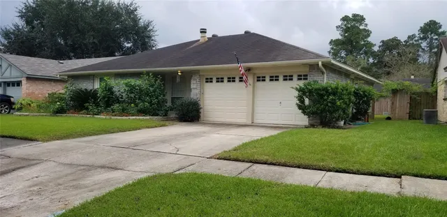 a view of a house with a garden