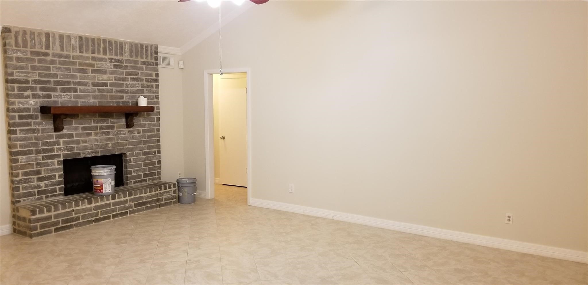 6702 Lynngate Drive Spring, TX 77373 - Photo 3 of 6 a view of empty room with fireplace