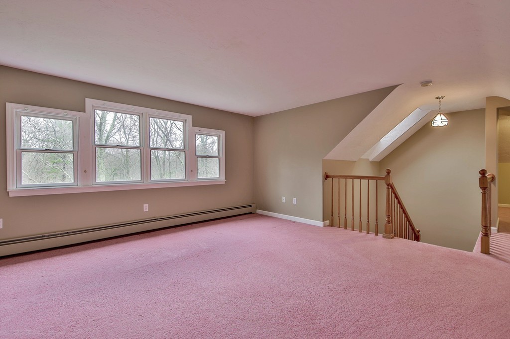 209 Main Street Boxford, MA 01921 - Photo 21 of 30 a view of an empty room with a window