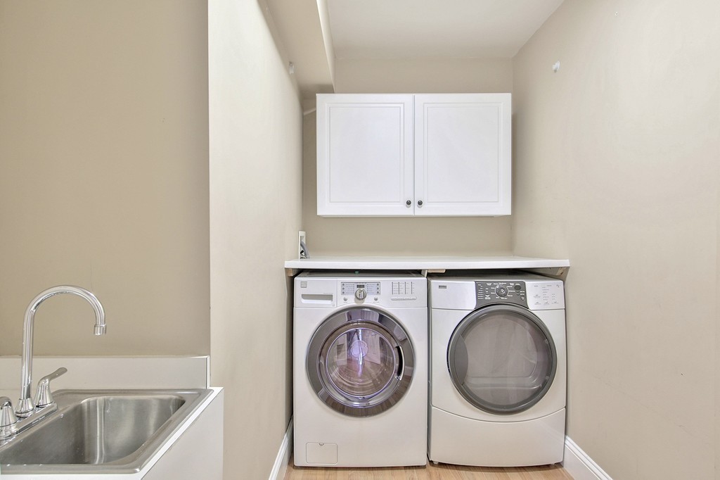 209 Main Street Boxford, MA 01921 - Photo 23 of 30 a utility room with sink dryer and washer