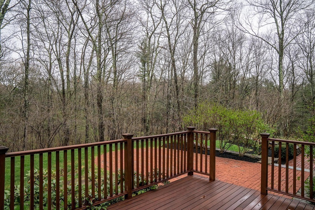 209 Main Street Boxford, MA 01921 - Photo 25 of 30 a balcony with wooden floor and fence