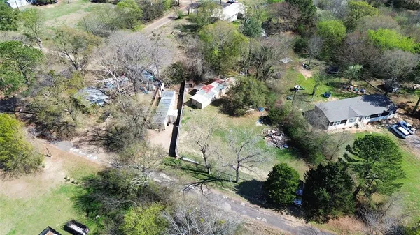 an aerial view of residential house with outdoor space