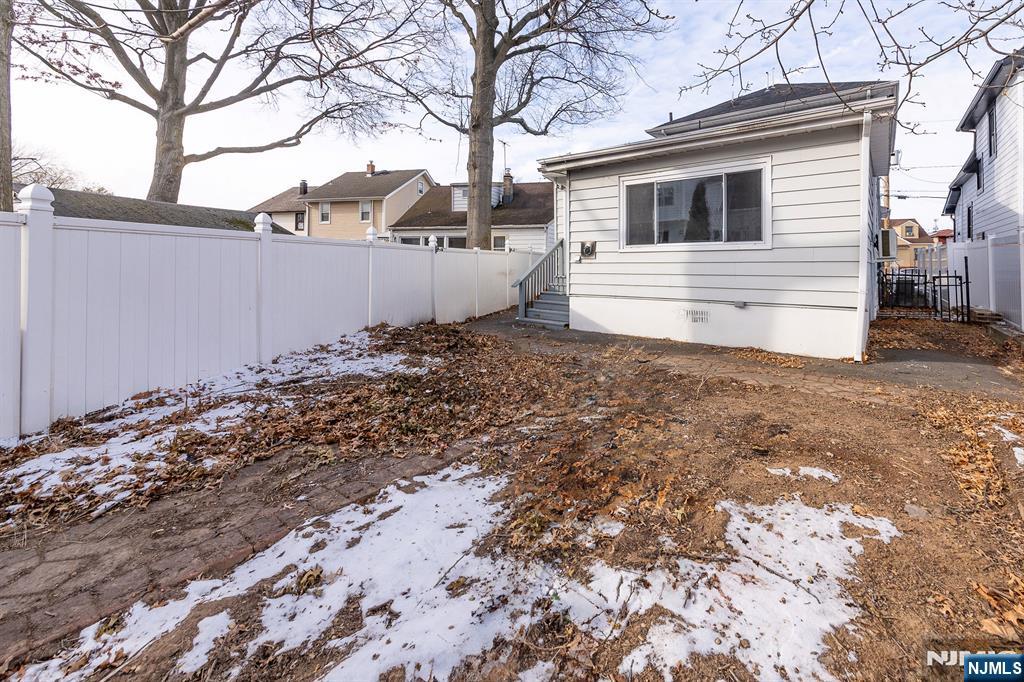 34 Kearny Street Lyndhurst, NJ 07071 - Photo 29 of 29 a view of a house with a yard