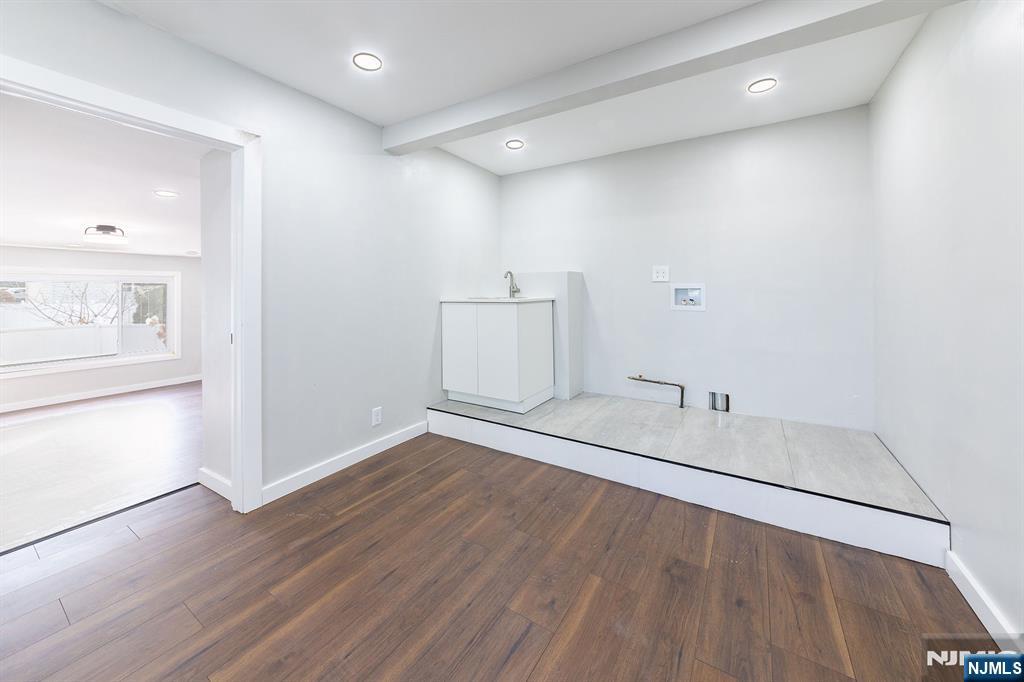 34 Kearny Street Lyndhurst, NJ 07071 - Photo 10 of 29 a view of a room with wooden floor and cabinet
