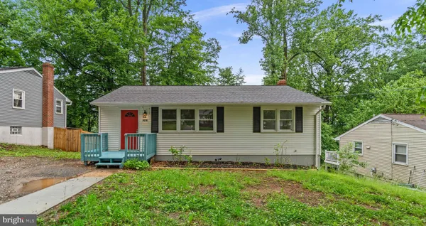 a view of front of house with a yard