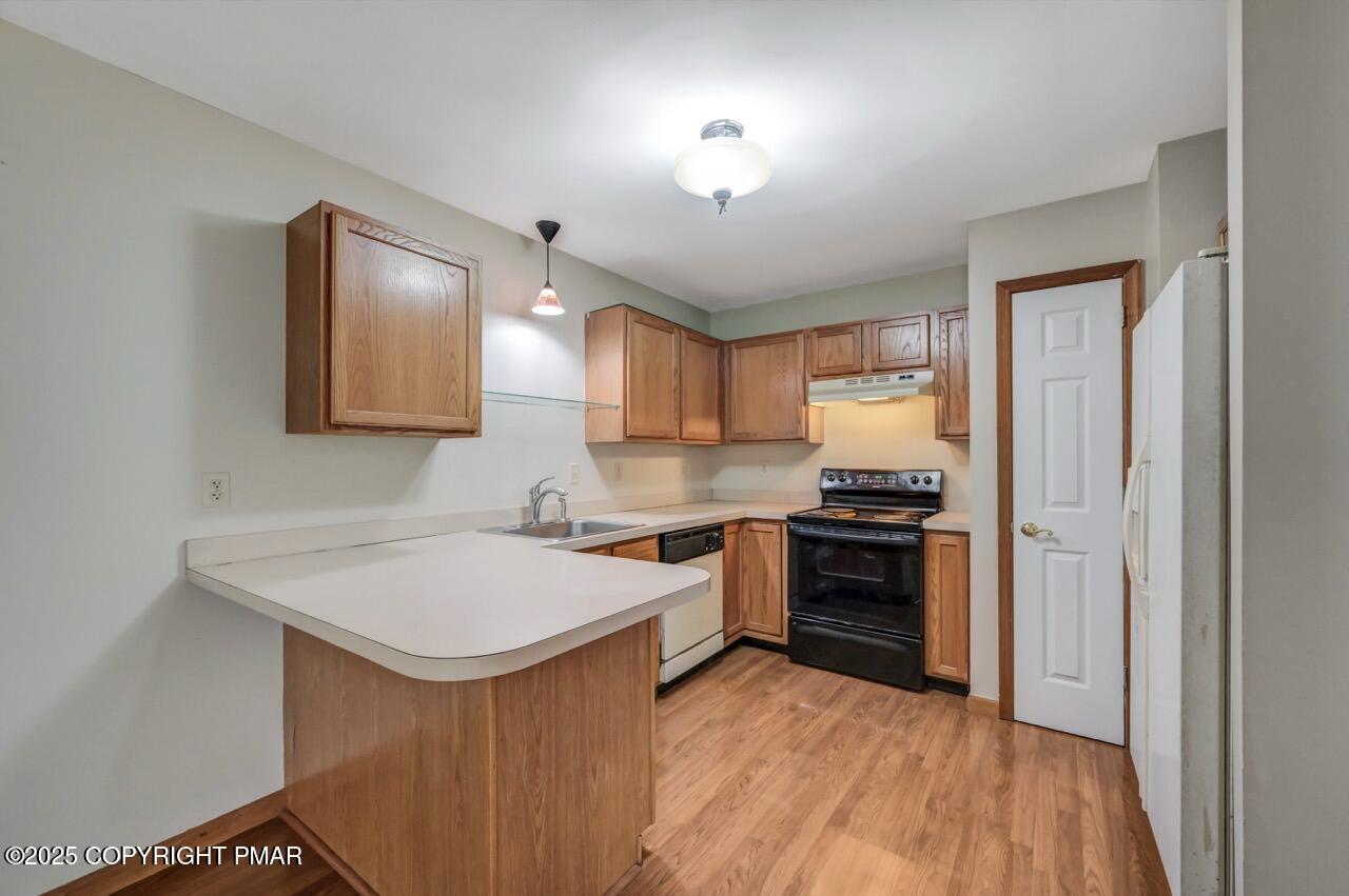613 Country Acres Court Effort, PA 18330 - Photo 15 of 40 a kitchen with a sink appliances and cabinets