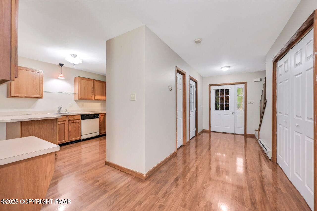 613 Country Acres Court Effort, PA 18330 - Photo 18 of 40 a view of a kitchen cabinets a sink and wooden floor