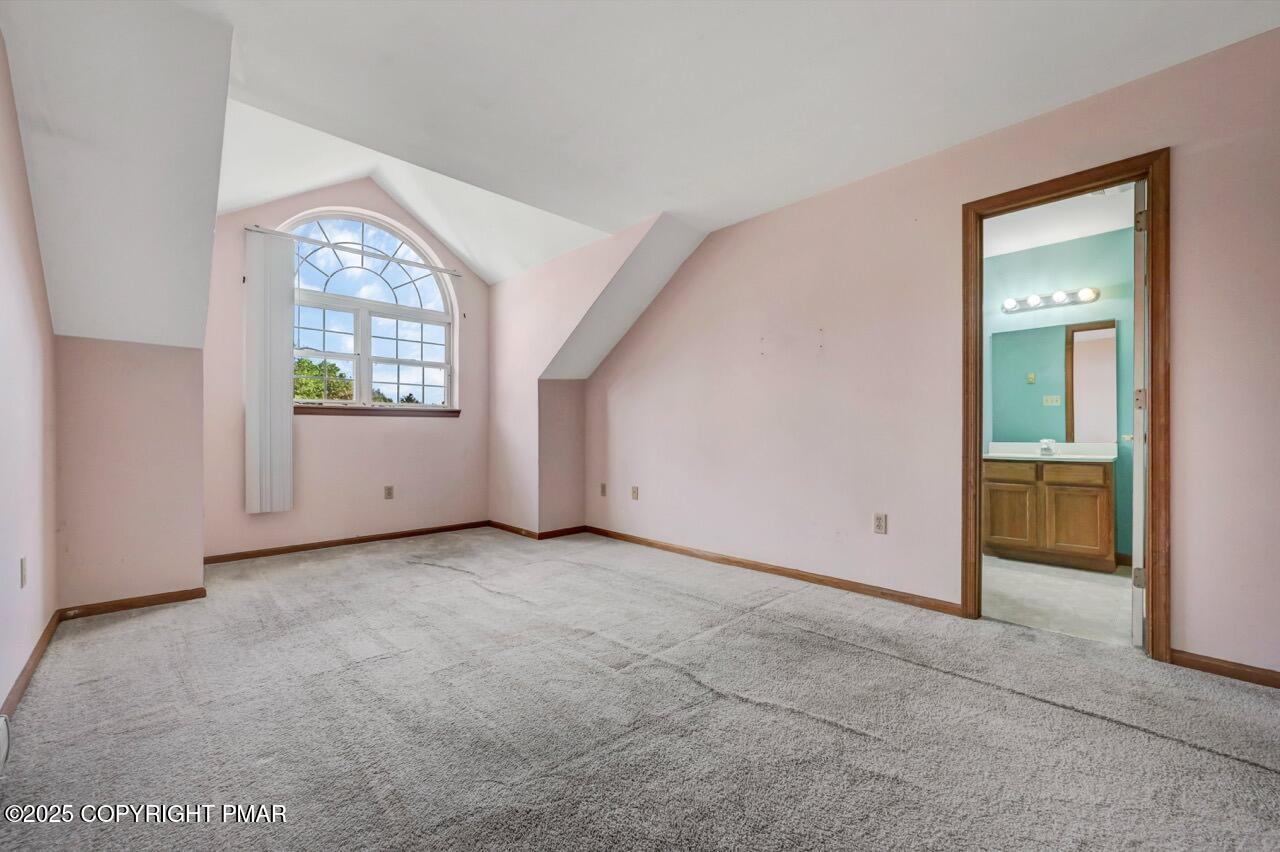 613 Country Acres Court Effort, PA 18330 - Photo 23 of 40 an empty room with windows and closet