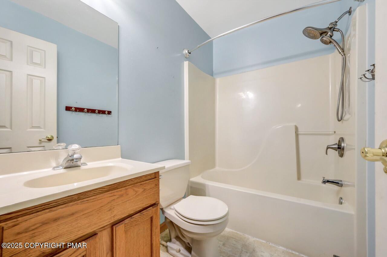 613 Country Acres Court Effort, PA 18330 - Photo 31 of 40 a bathroom with a sink toilet and shower