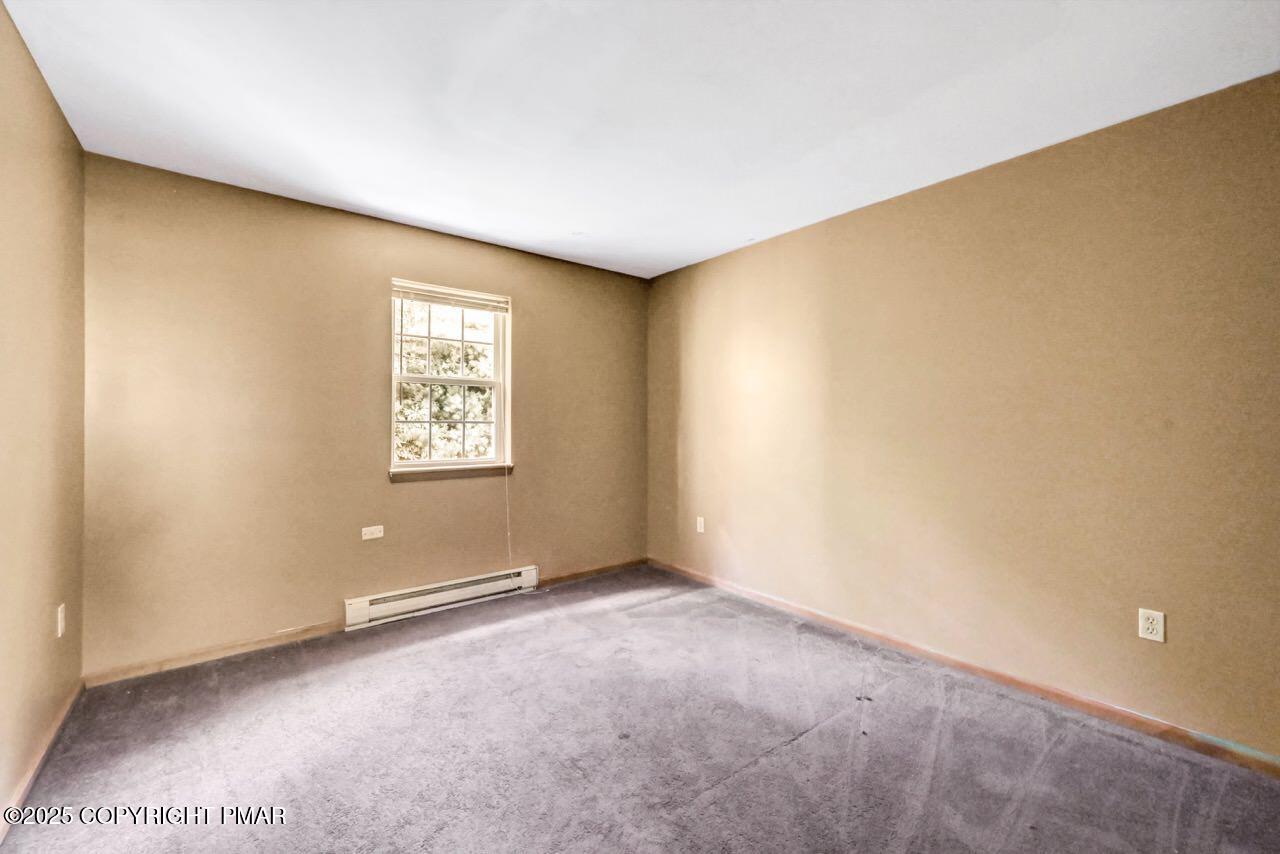 613 Country Acres Court Effort, PA 18330 - Photo 33 of 40 an empty room with windows