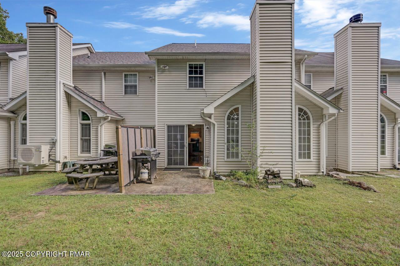 613 Country Acres Court Effort, PA 18330 - Photo 38 of 40 a front view of a house with a yard