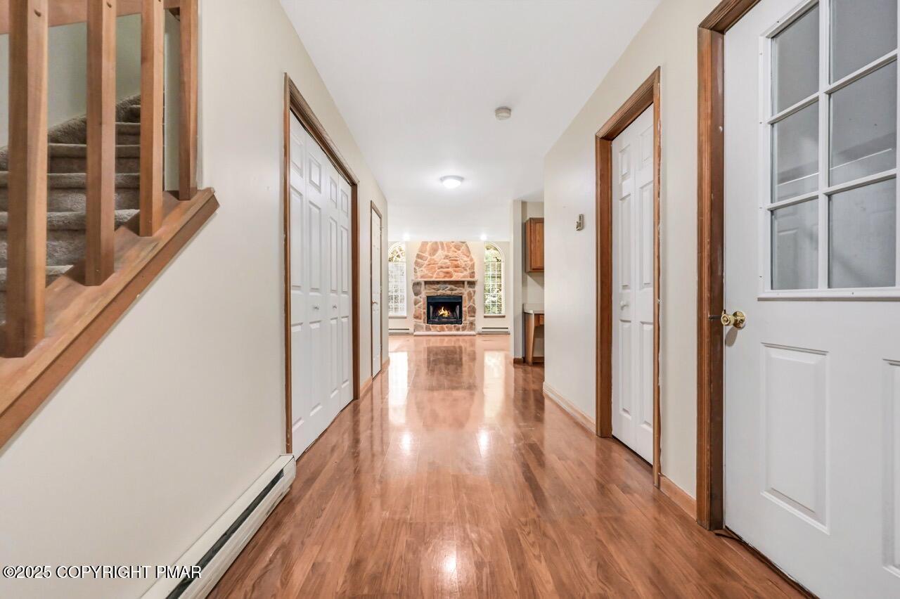 613 Country Acres Court Effort, PA 18330 - Photo 4 of 40 a view of a hallway view with wooden floor and furniture