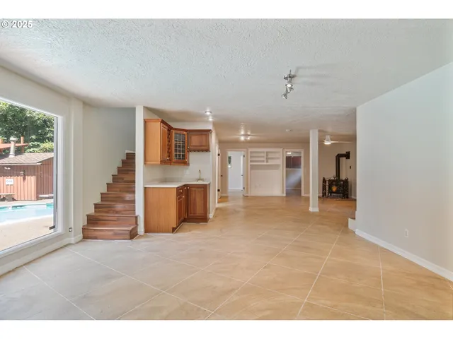 a bathroom with a sink toilet and a mirror