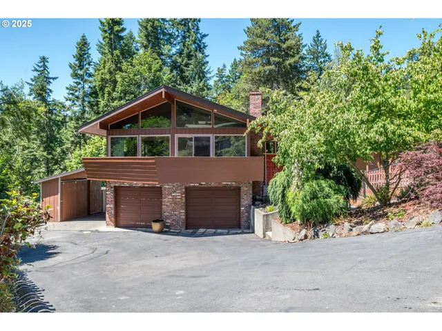 a house with a tree in the background
