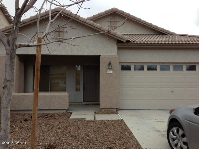 44317 Rhinestone Road Maricopa, AZ 85139 - Photo 1 of 1 a front view of a house