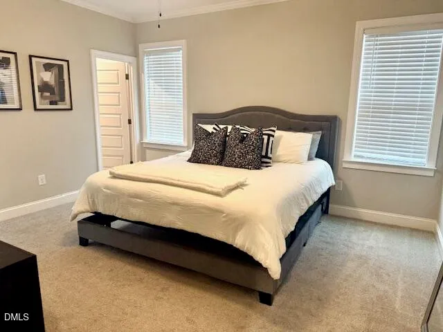 a bedroom with a bed and wall painting