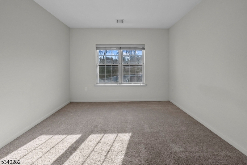 41 Park Drive, Unit 41 Clinton, NJ 08809 - Photo 23 of 38 an empty room with a window