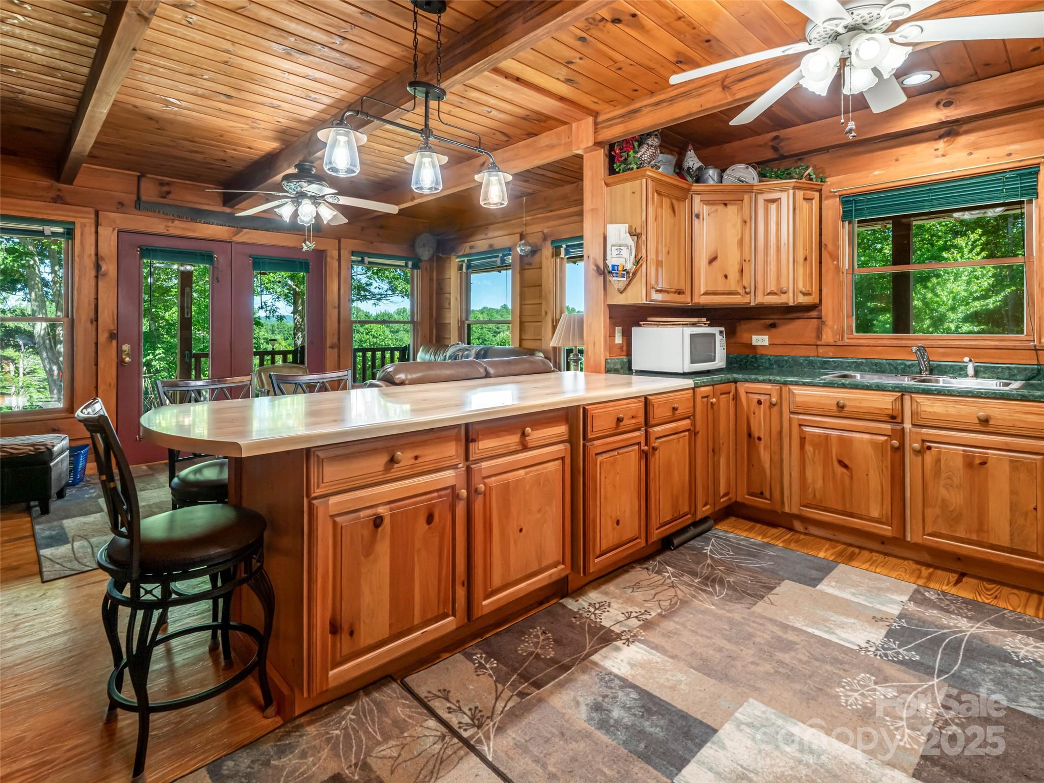 129 Melrose Lake Road Saluda, NC 28773 - Photo 15 of 48 a large kitchen with a large window