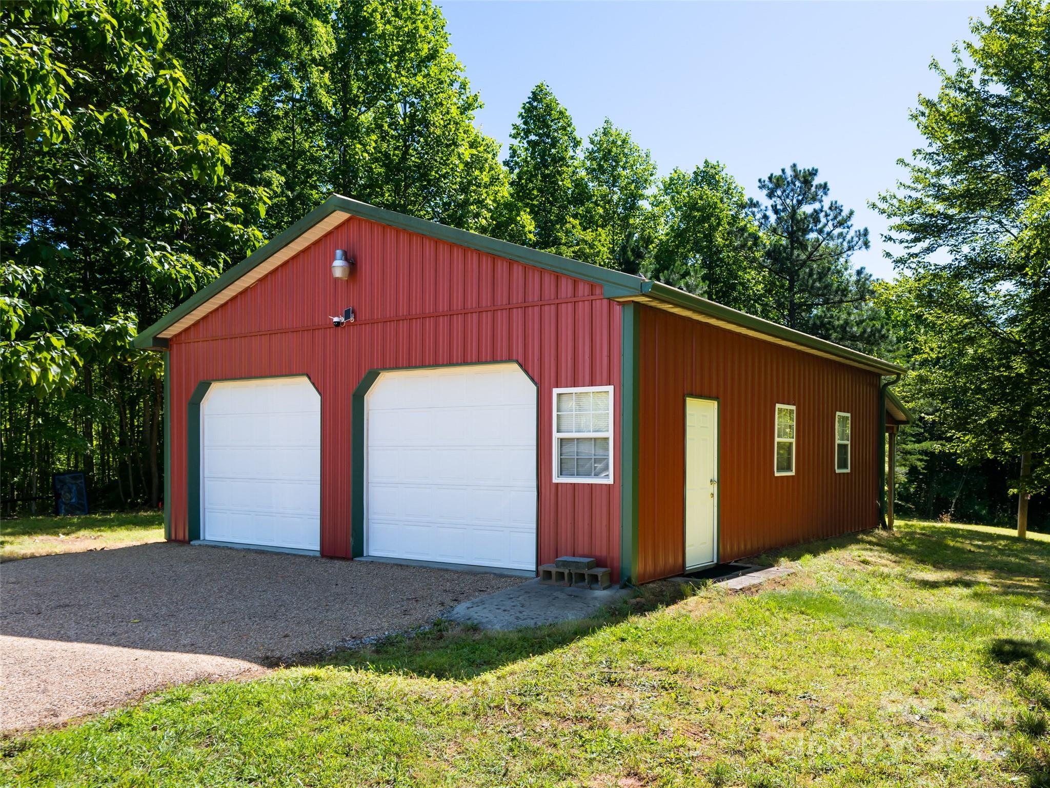 129 Melrose Lake Road Saluda, NC 28773 - Photo 31 of 48 a view of a backyard of the house