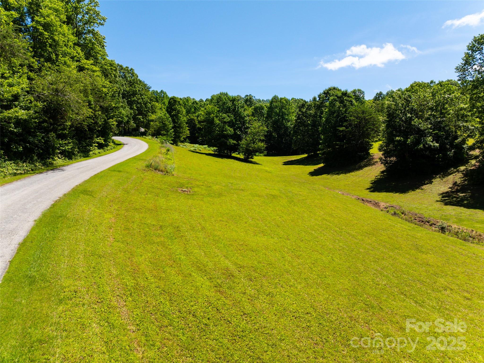 129 Melrose Lake Road Saluda, NC 28773 - Photo 46 of 48 a view of a swimming pool and an outdoor space