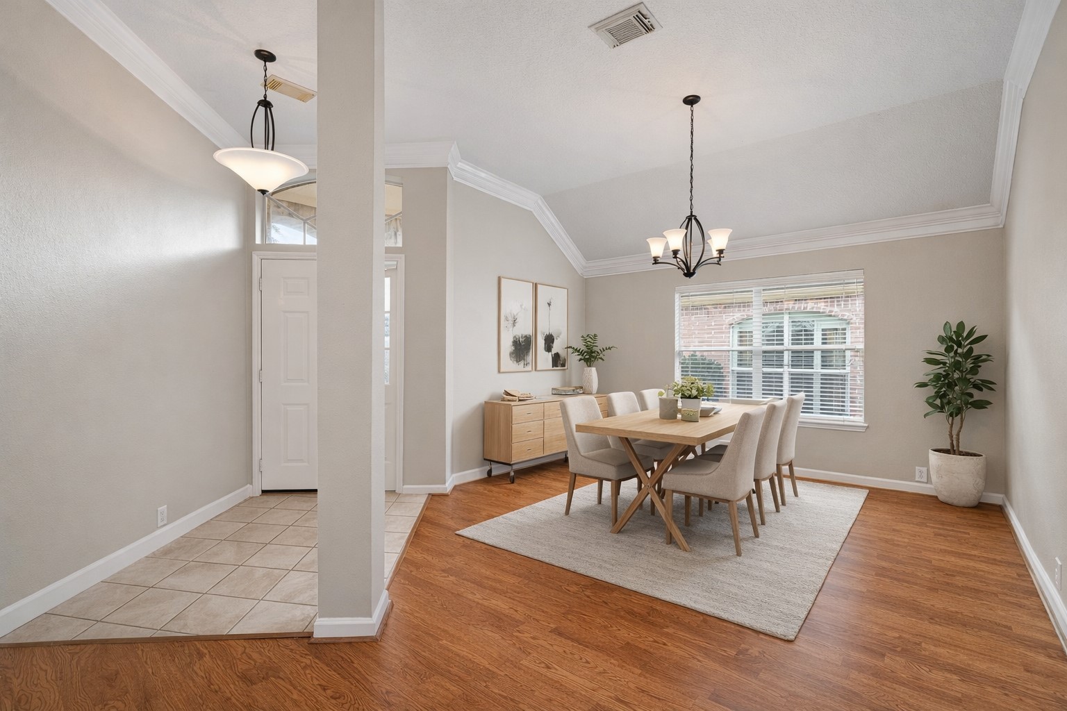2218 Louetta Brook Lane Spring, TX 77388 - Photo 3 of 18 a view of a dining room with furniture window and wooden floor