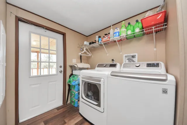 a utility room with dryer and washer