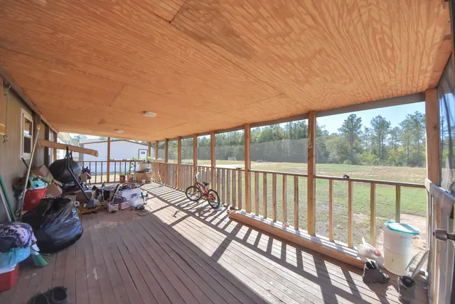 a view of balcony with chairs