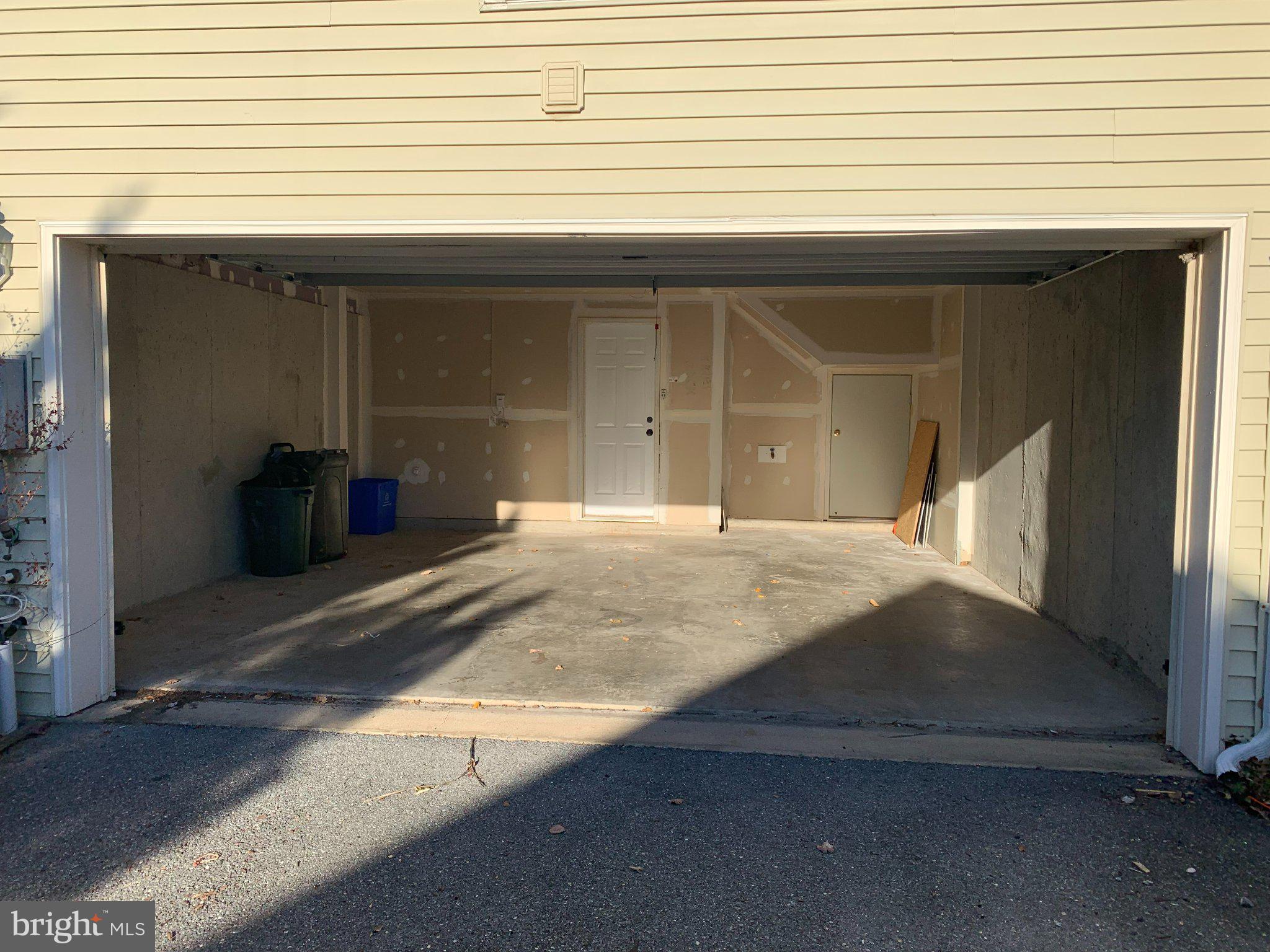 12956 Clarksburg Square Road Clarksburg, MD 20871 - Photo 16 of 16 Spacious garage ready for your vision.