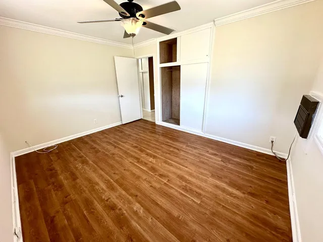a bathroom with a toilet a sink and a shower