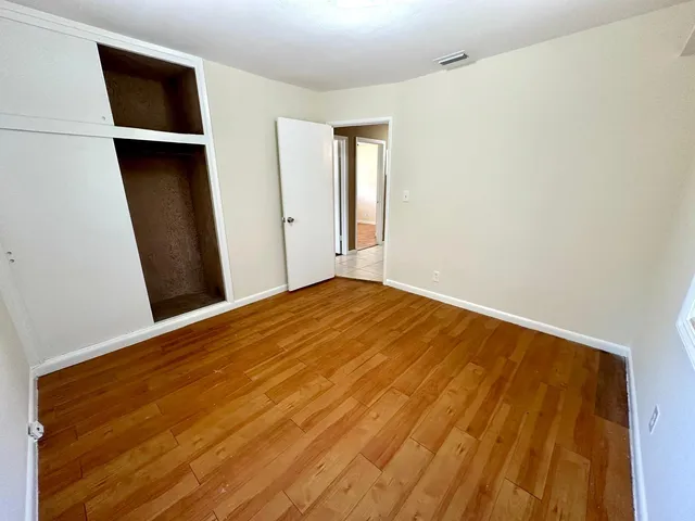 a view of an empty room and window