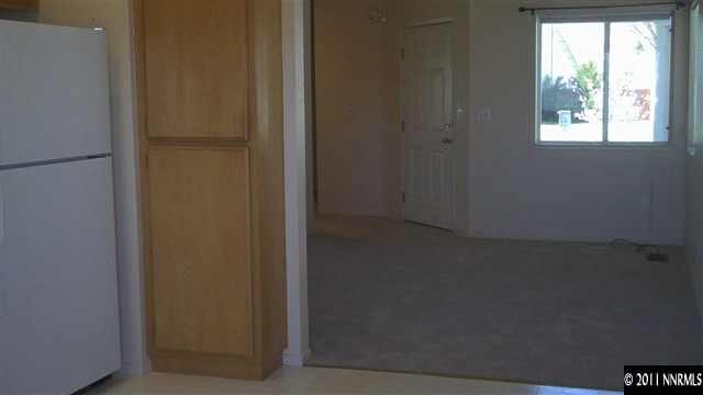 7534 Devonshire Lane Reno, NV 89511 - Photo 6 of 8 a view of an empty room