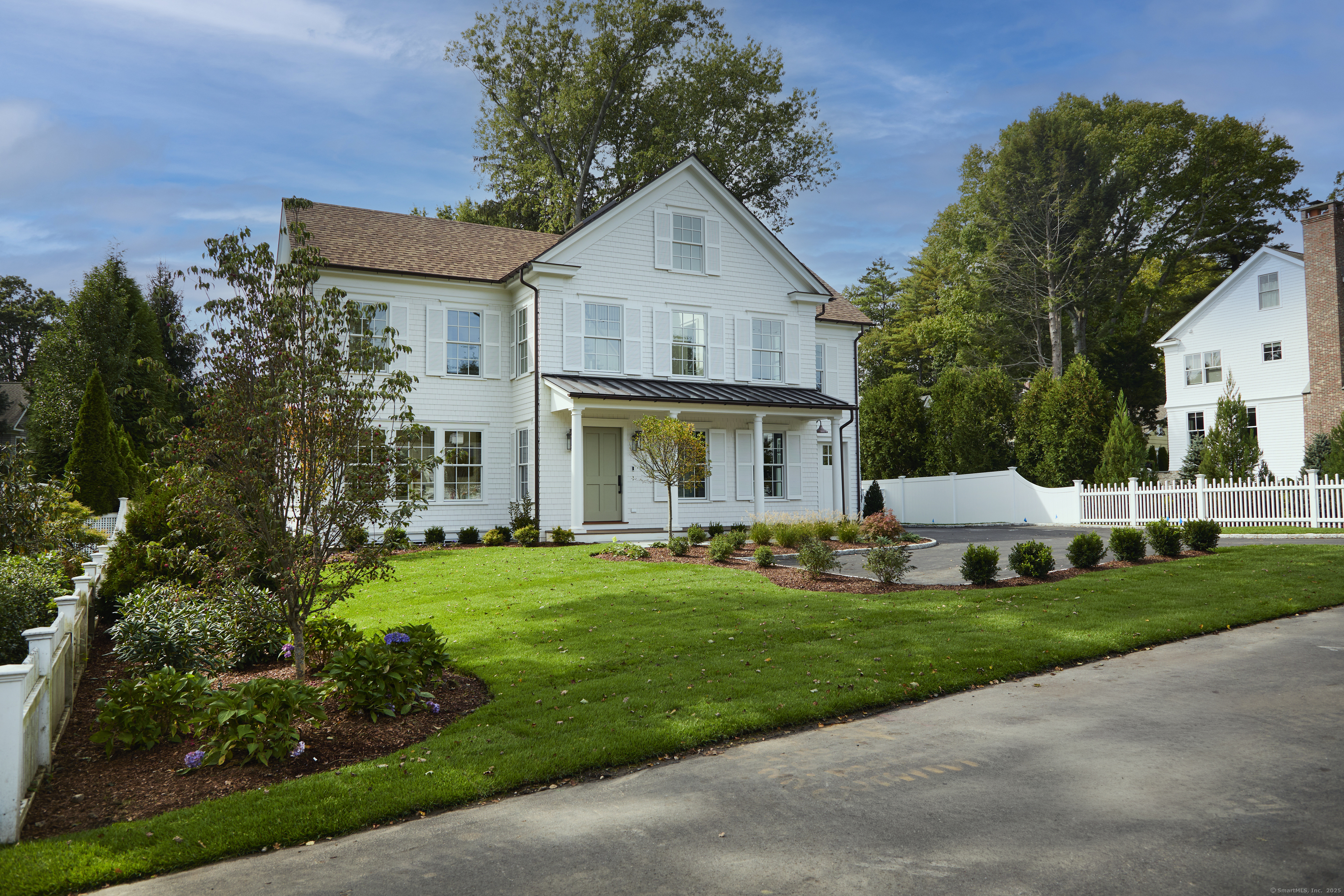5 Franklin Avenue Westport, CT 06880 - Photo 2 of 16 front view of a house with a yard