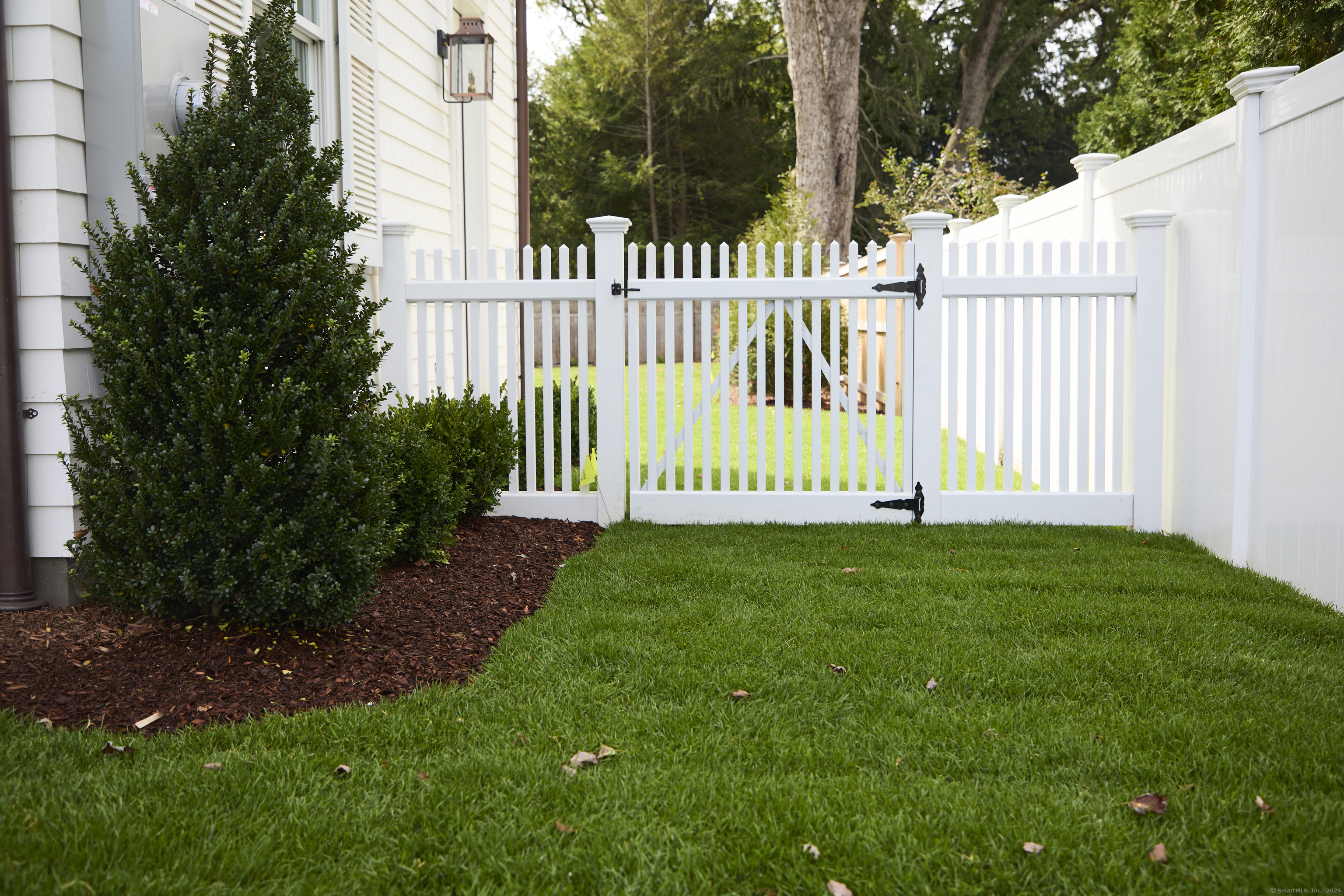 5 Franklin Avenue Westport, CT 06880 - Photo 4 of 16 a view of a yard with a garden