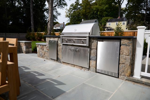 a view of a kitchen with a sink and dishwasher