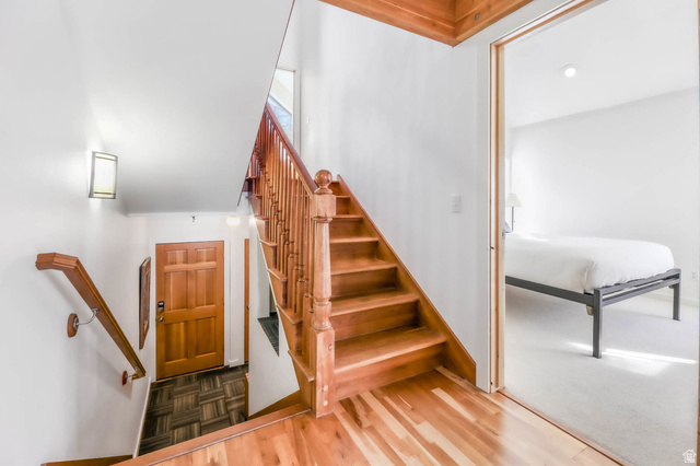 9927 Powder Run Road, Unit 10B Alta, UT 84092 - Photo 5 of 31 Stairs with beautiful hardwood