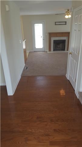 Enter through the large open entry way.