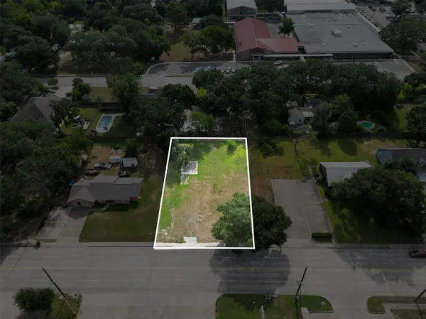 an aerial view of house with yard