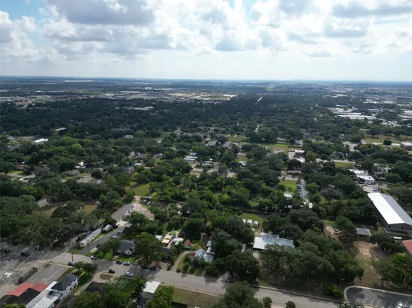 an aerial view of a city with lots of residential buildings